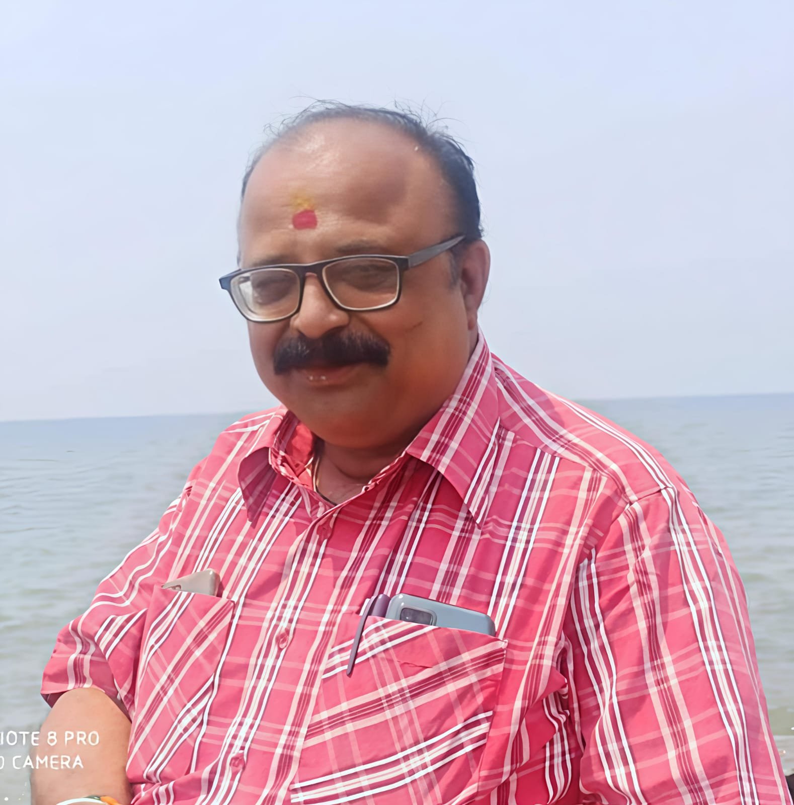 Dr. Prabhakar Mandre 